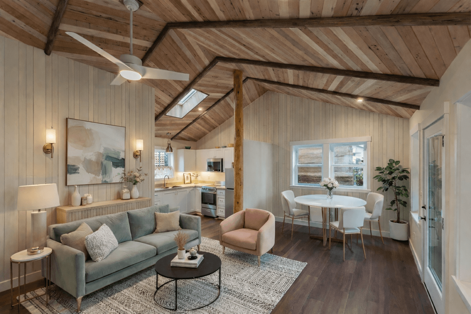 Cottage living room with vaulted wood ceiling