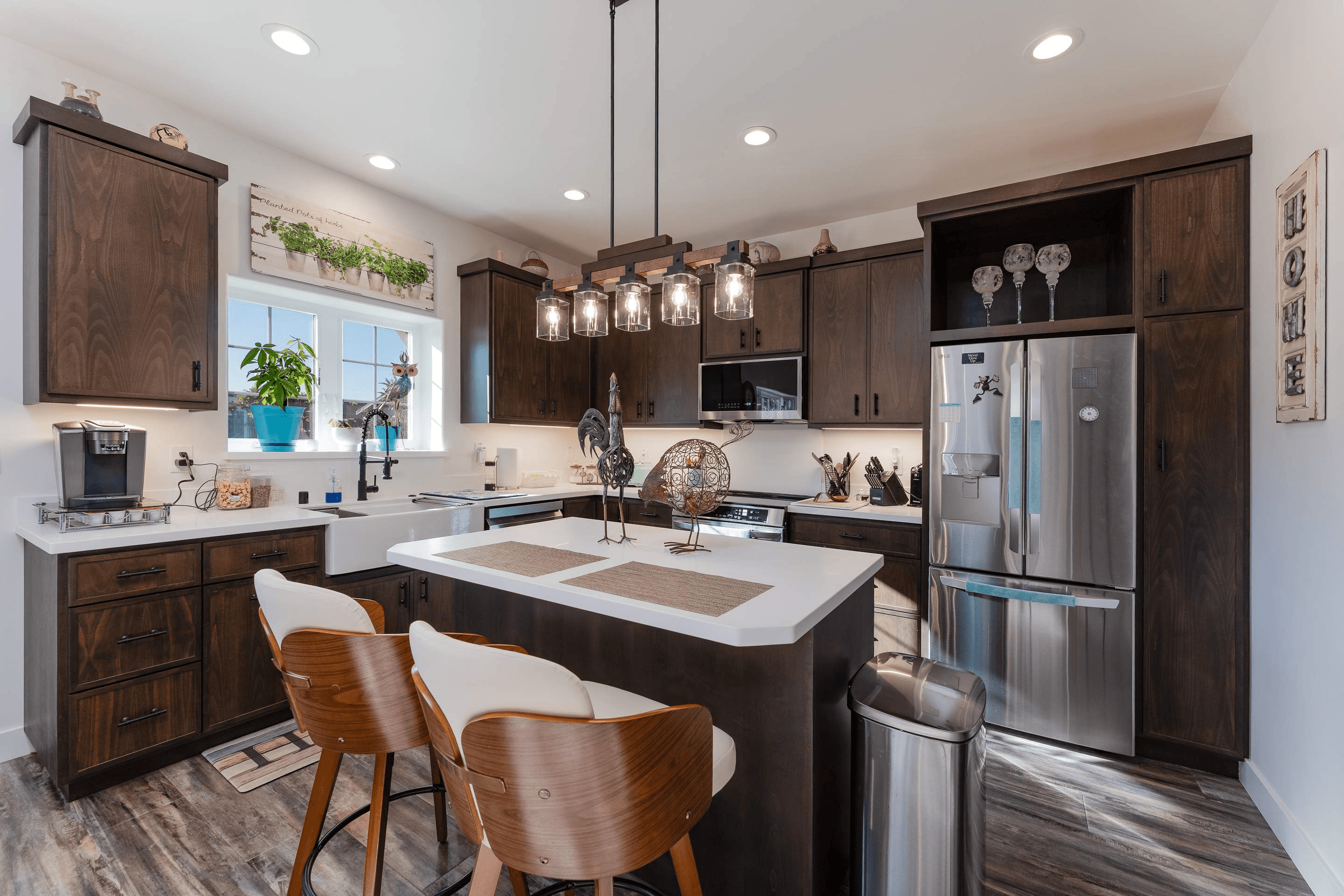 Kitchen with dark wood cabinets and island